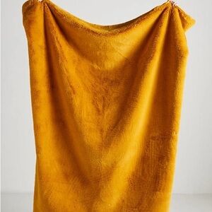 Anthropologie Sophie Faux Fur Blanket in Yellow